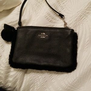 Coach fur trimmed wristlet